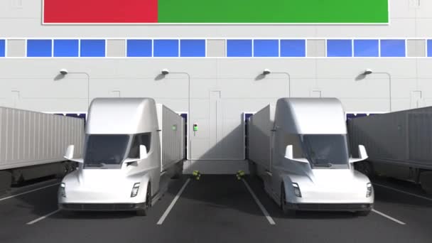 Φορτηγά ρυμουλκών στο χώρο φόρτωσης της αποθήκης με σημαία OMAN. Omani logistics σχετικές έννοιες 3D animation — Αρχείο Βίντεο