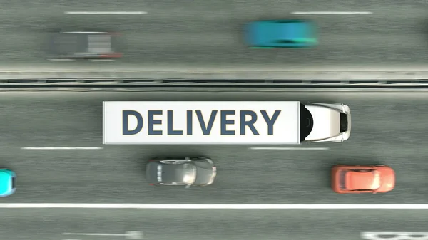 Вид с воздуха на прицеп грузовика с ДЕЙСТВИТЕЛЬНЫМ текстом, движущимся по шоссе. 3D рендеринг — стоковое фото