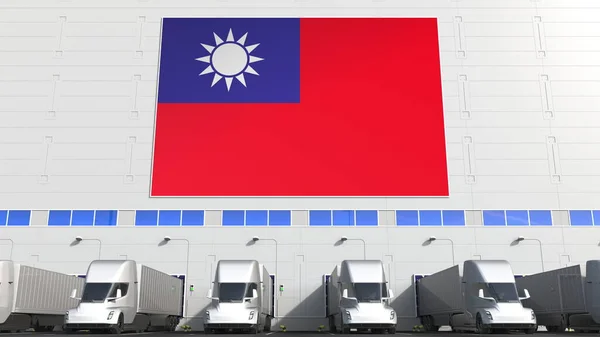 Electric trailer trucks at warehouse loading bay with flag of TAIWAN. Taiwanese logistics related conceptual 3D rendering — Stock Photo, Image