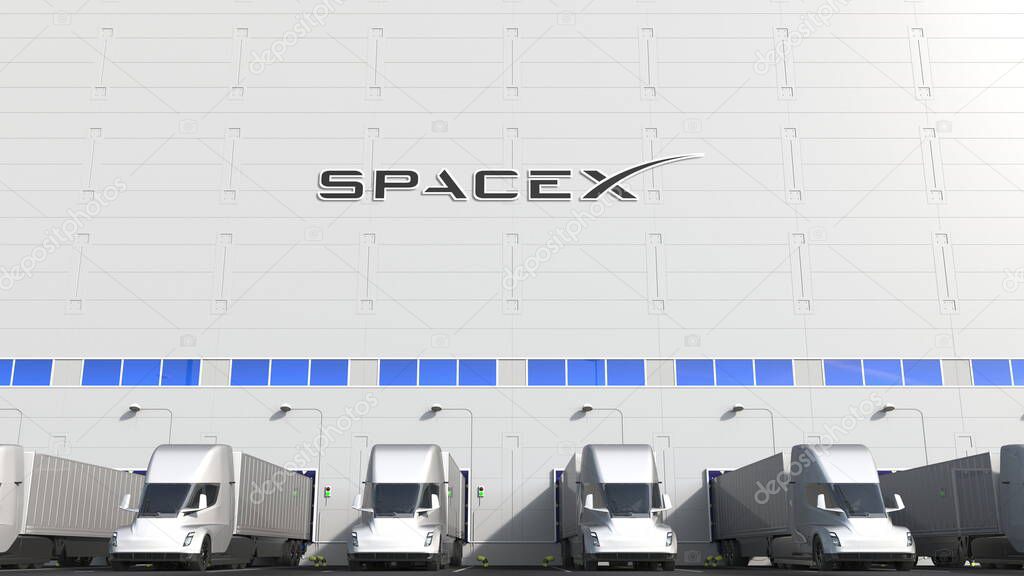 Trailer trucks at warehouse loading bay with logo on the wall. Editorial 3D