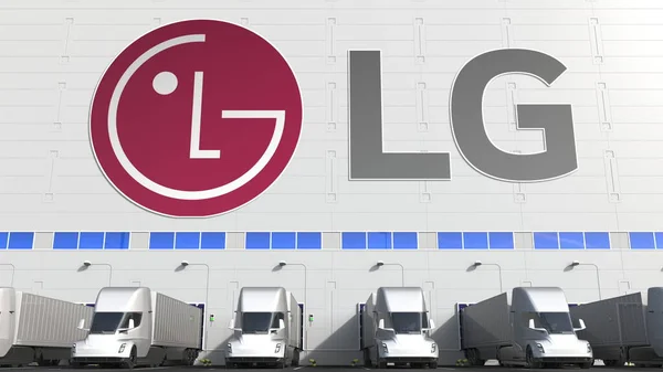 Semirimorchi elettrici nella zona di carico del magazzino con logo LG sulla parete. Rendering editoriale 3D — Foto Stock