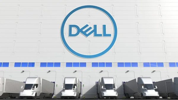 Elektrische opleggers op magazijn laadperron met Dell logo aan de muur. Redactionele 3d-weergave — Stockfoto