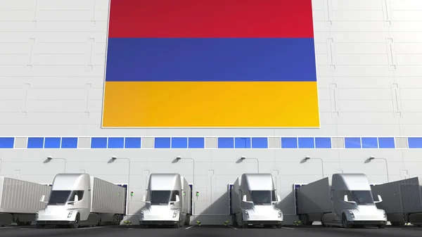 Camiones semirremolques en muelle de carga de almacén con bandera de ARMENIA. Renderizado 3D conceptual relacionado con logística armenia —  Fotos de Stock