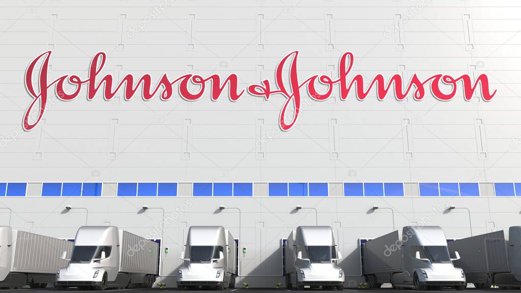 Trailer trucks at warehouse loading bay with logo on the wall. Editorial 3D