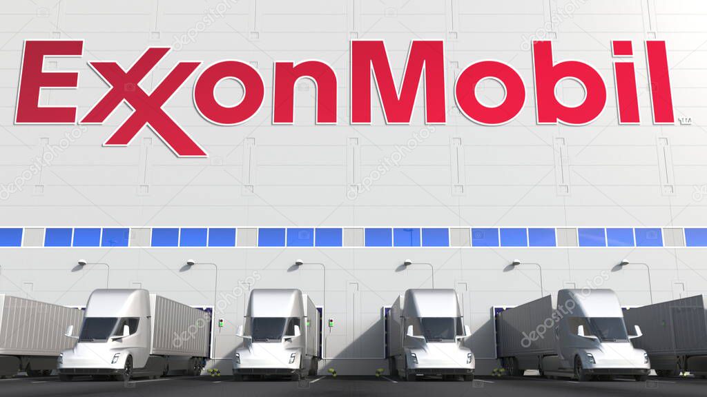 Trailer trucks at warehouse loading bay with logo on the wall. Editorial 3D