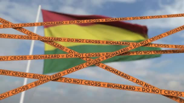 Линии ограничения биологической опасности против боливийского флага. Ограниченный въезд или карантин в Боливии. Концептуальная петля 3D анимации — стоковое видео