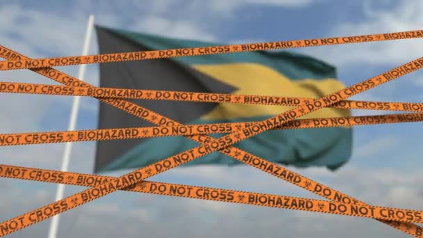 Não cruze as linhas de fita de risco biológico no fundo da bandeira das Bahamas. Entrada restrita ou quarentena nas Bahamas. Conceptual looping animação 3D — Vídeo de Stock