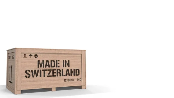 Dřevěná bedna s textem Made In Switzerland na bílém pozadí. Švýcarská průmyslová výroba související 3d rendering — Stock fotografie