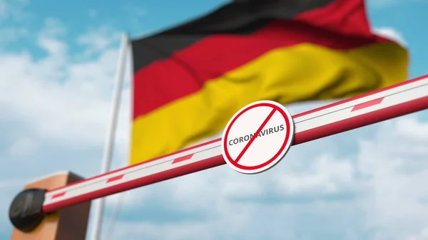 Закрытие шлагбаума табличкой STCORONAVIRUS на фоне немецкого флага. Карантин в Германии. 3D рендеринг — стоковое фото