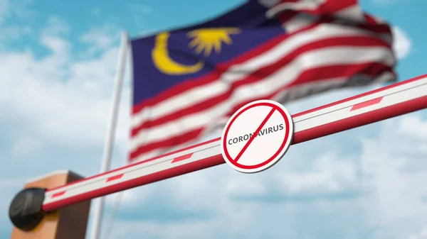 Барьерные ворота с табличкой STOP CORONAVIRUS закрываются на фоне флага Малайзии. Малайзийский карантин. 3D рендеринг — стоковое фото