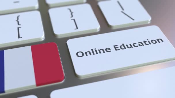 Çevrimiçi Eğitim metni ve Fransa bayrağı bilgisayar klavyesindeki düğmelerde. Modern profesyonel eğitim ile ilgili kavramsal 3D animasyon — Stok video