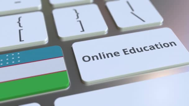 Online Edukacja tekst i flaga Uzbekistanu na przyciskach na klawiaturze komputera. Nowoczesne szkolenia zawodowe związane koncepcyjny animacja 3D — Wideo stockowe