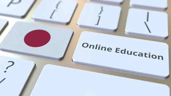 Online Education text and flag of Japan on the buttons on the computer keyboard (en inglés). Formación profesional moderna relacionada con la representación conceptual 3D —  Fotos de Stock