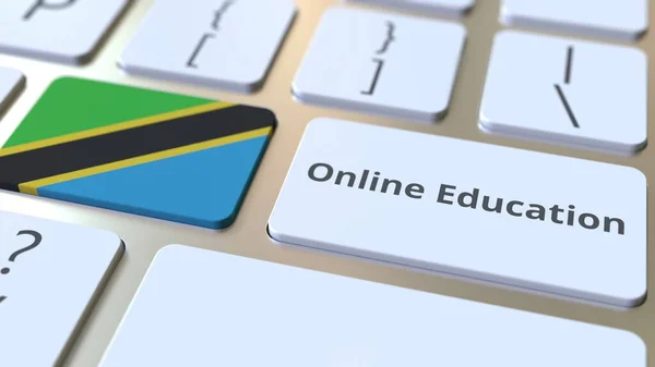 Online Vzdělávání text a vlajka Tanzanie na tlačítkách na klávesnici počítače. Moderní profesionální školení související konceptuální 3D vykreslování — Stock fotografie