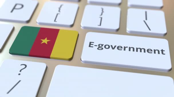 E-gobierno o Gobierno Electrónico texto y bandera de Camerún en el teclado. Animación 3D conceptual relacionada con los servicios públicos modernos — Vídeos de Stock