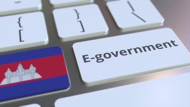 Ηλεκτρονικό κυβερνητικό κείμενο ή ηλεκτρονικό κυβερνητικό κείμενο και σημαία της Καμπότζης στο πληκτρολόγιο. Σύγχρονες δημόσιες υπηρεσίες σχετικές εννοιολογικές 3d κινούμενα σχέδια — Αρχείο Βίντεο