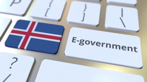 Texto de gobierno electrónico o Gobierno electrónico y bandera de Islandia en el teclado. Animación 3D conceptual relacionada con los servicios públicos modernos — Vídeos de Stock