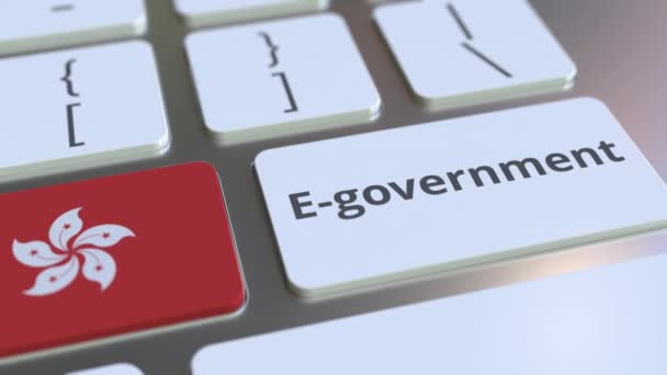 E-government of Electronic Government tekst en vlag van Hong Kong op het toetsenbord. Moderne conceptuele 3D-animatie van overheidsdiensten — Stockvideo