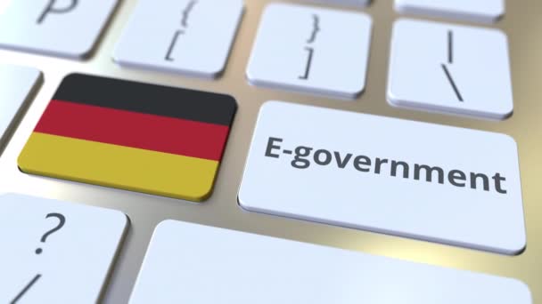 E-government ή Electronic Government κείμενο και σημαία της Gemany στο πληκτρολόγιο. Σύγχρονες δημόσιες υπηρεσίες σχετικές εννοιολογικές 3d κινούμενα σχέδια — Αρχείο Βίντεο