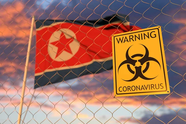 Aviso de coronavírus na vedação no fundo da bandeira norte-coreana ao pôr-do-sol. Entrada restrita ou quarentena na Coreia do Norte. Renderização 3D conceitual — Fotografia de Stock