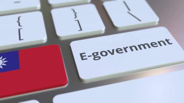 E-government or Electronic Government text and flag of Taiwan on the keyboard. Modern public services related conceptual 3D animation — Stock Video