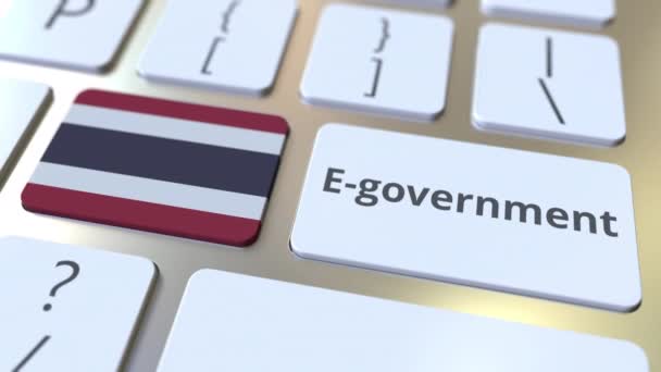 E-gobierno o Gobierno Electrónico texto y bandera de Tailandia en el teclado. Animación 3D conceptual relacionada con los servicios públicos modernos — Vídeos de Stock