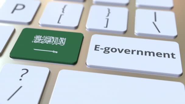 E-förvaltning eller elektronisk regeringstext och Saudiarabiens flagga på tangentbordet. Modern konceptbaserad 3D-animation för offentliga tjänster — Stockvideo
