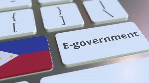 E-government atau Electronic Government teks dan bendera Filipina pada keyboard. Layanan publik modern terkait rendering konseptual 3D — Stok Foto