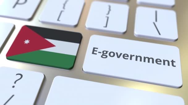 E-government ή Electronic Government κείμενο και σημαία της Ιορδανίας στο πληκτρολόγιο. Σύγχρονες δημόσιες υπηρεσίες σχετικές εννοιολογικές 3d κινούμενα σχέδια — Αρχείο Βίντεο