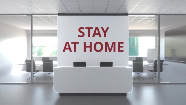 STAY AT HOME text on the wall of an abandoned generic modern office. Remote work or quarantine related 3D animation — ストック動画