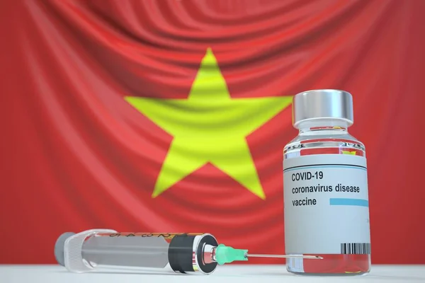 COVID-19 injectieflacon met coronavirusvaccin en spuit tegen de Vietnamese vlag. Medisch onderzoek en vaccinatie in Vietnam, 3D rendering — Stockfoto