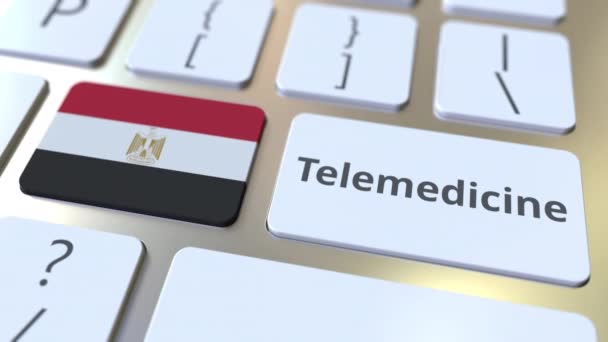 Telemedicína text a vlajka Egypta na klávesnici počítače. Vzdálená lékařská služba související konceptuální 3D animace — Stock video