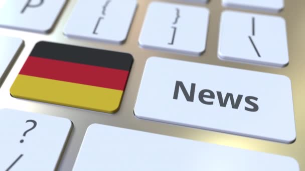 Nachrichtentext und Flagge von Deutschland auf den Tasten einer Computertastatur. Nationale konzeptionelle 3D-Animation für Online-Medien — Stockvideo