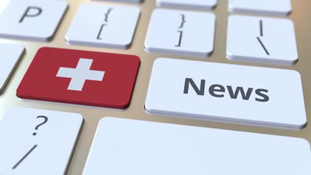 News text and flag of Switzerland on the keys of a computer keyboard. National online media related conceptual 3D animation — Stock Video