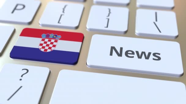 Hırvatistan 'ın haber metni ve bayrağı bir bilgisayar klavyesinde. Ulusal çevrimiçi medya ile ilgili kavramsal 3D animasyon — Stok video