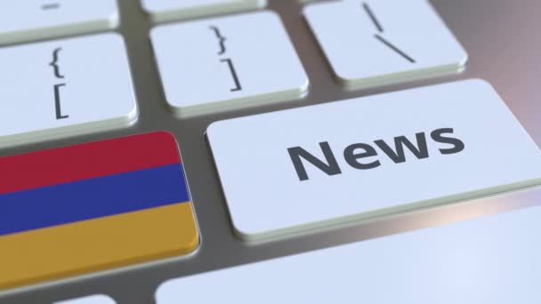 コンピュータのキーボードのキーにアルメニアのニューステキストとフラグ。全国オンラインメディア関連の概念3Dアニメーション — ストック動画