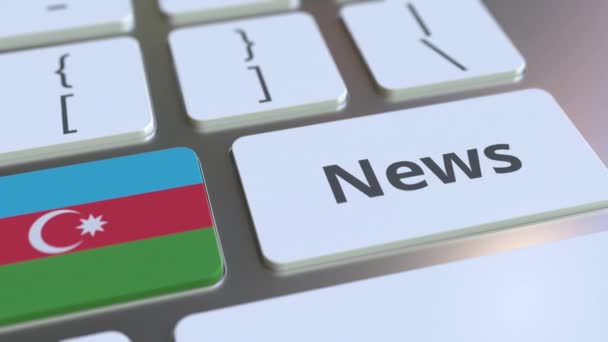 Nyheter text och flagga Azerbajdzjan på tangenterna till ett datortangentbord. Nationella online media relaterade konceptuell 3D-animering — Stockvideo