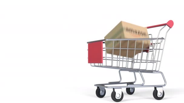 Caixas com logotipo AMAZON no carrinho de compras. Animação 3D editorial — Vídeo de Stock