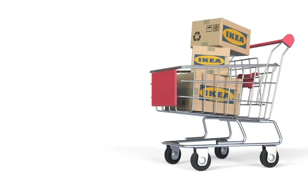Trzy kartony z logo IKEA w wózku sklepowym. Redakcja renderowania 3D — Zdjęcie stockowe