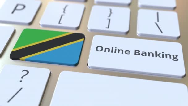 Online Banking text och flagga Tanzania på tangentbordet. Internetfinansieringsrelaterad konceptuell 3D-animering — Stockvideo
