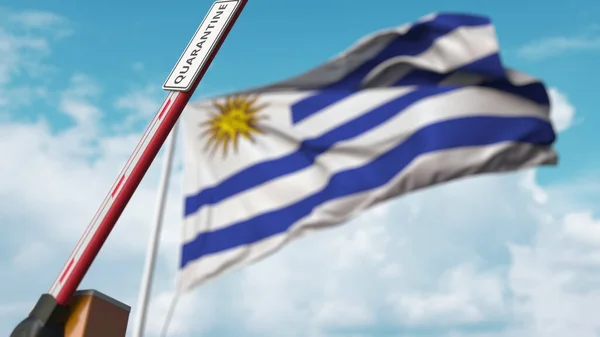 Membuka penghalang boom dengan tanda QUARANTINE terhadap bendera Uruguay. Penguncian berakhir di Uruguay. Perender 3D — Stok Foto