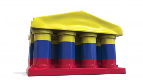 Deflating inflatable bank or government building with printed flag of Colombia. Colombian economic or political crisis related conceptual 3D animation — Stock Video