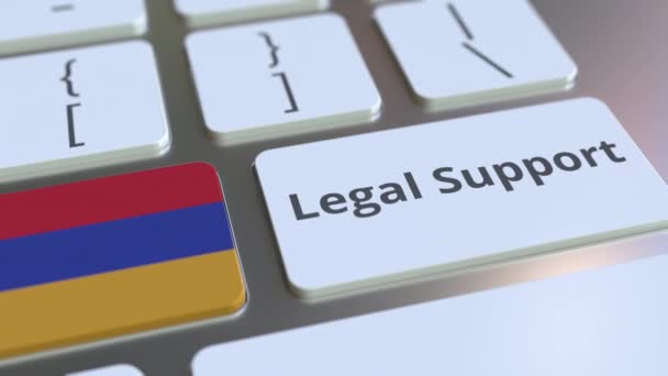 Текст юридичної підтримки та прапор Вірменії на клавіатурі комп'ютера. Мережева юридична служба пов'язана з 3D анімацією — стокове відео
