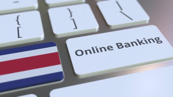 Online bankieren tekst en vlag van Costa Rica op het toetsenbord. Internet financiering gerelateerde conceptuele 3D animatie — Stockvideo
