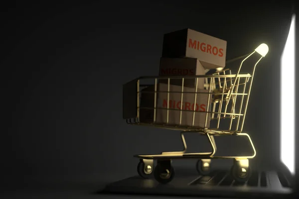 Doosjes met MIGROS logo in gouden winkelwagen op computer toetsenbord. Redactionele premium online service gerelateerde 3D rendering — Stockfoto