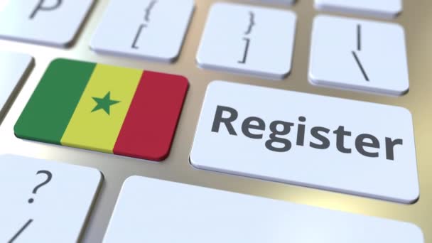 Registreer tekst en vlag van Senegal op het toetsenbord. Online diensten gerelateerde 3D animatie — Stockvideo
