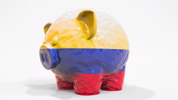 Deflatoire opblaasbare spaarpot met bedrukte vlag van Colombia. Colombiaanse financiële crisis gerelateerde conceptuele 3D-animatie — Stockvideo