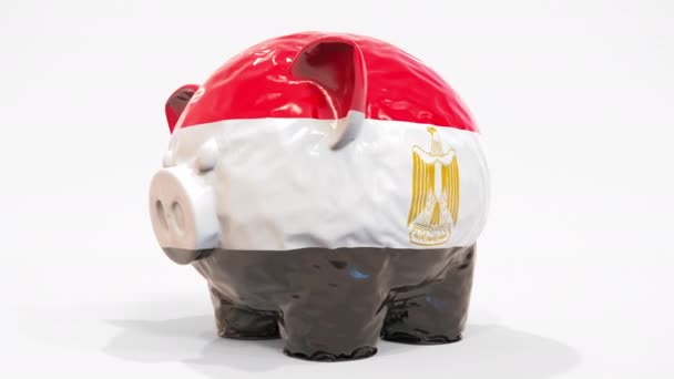 Deflatoire opblaasbare spaarpot met bedrukte vlag van Egypte. Egyptische financiële crisis gerelateerde conceptuele 3D-animatie — Stockvideo