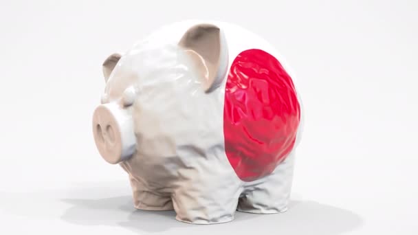 Deflating inflatable piggy bank with printed flag of Japan. Japanese financial crisis related conceptual 3D animation — Stock Video