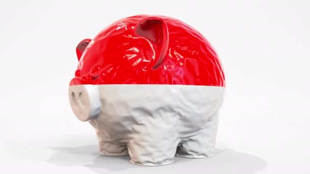 Deflating alcancía inflable con bandera impresa de Indonesia. Animación 3D conceptual relacionada con la crisis financiera indonesia — Vídeos de Stock